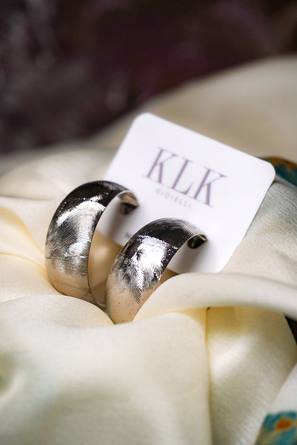 Orecchini cerchi larghi striati