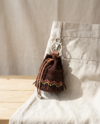 Pochette da donna in pelle con frange