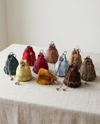 Pochette da donna in pelle con frange